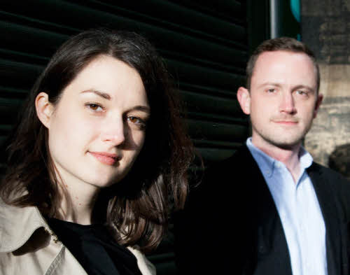 Trish Clowes and Ross Stanley head and shoulders. Trish is standing slightly nearer the camera than Ross